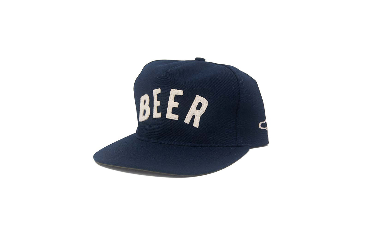 Navy blue cap with 'BEER' printed on it against a white background